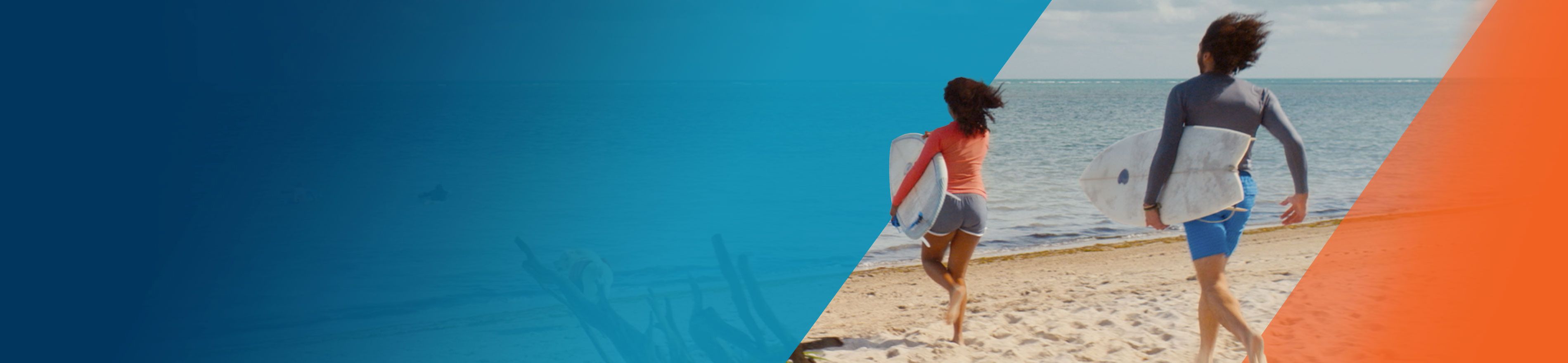 Potential OPDIVO® (nivolumab) user with his friend, running to the ocean to surf.