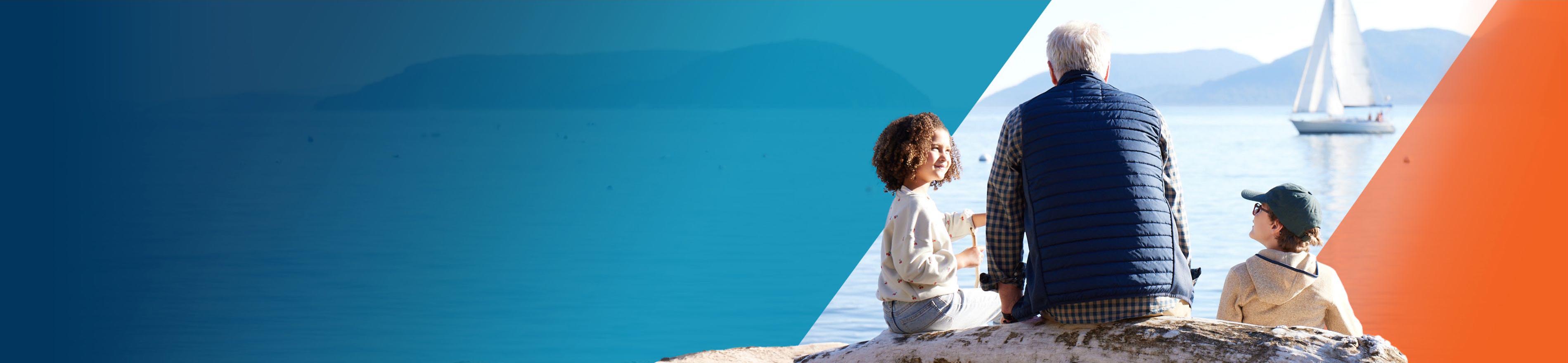 Potential OPDIVO® (nivolumab) user, sitting with his grandchildren watching sailboats.