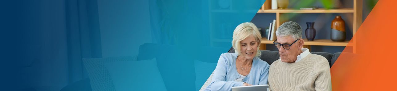 An older couple reviewing helpful financial resources from OPDIVO®.